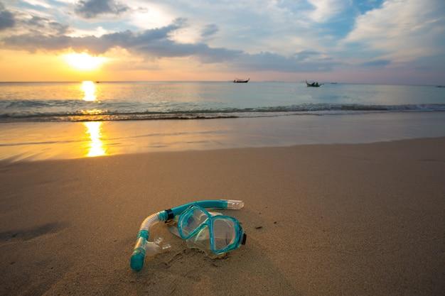 mask and snorkel diving on the beach